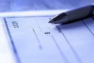 Ручка, используемая для заполнения банковского чека