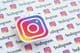 Логотип Instagram, напечатанный на бумаге